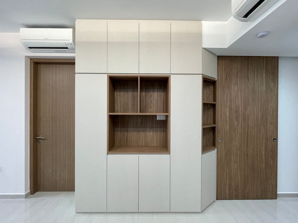 Built-in pantry wall cabinet in modern Scandinavian design installed in living room to maximize storage space.